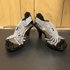 Black heels, with sequin design.